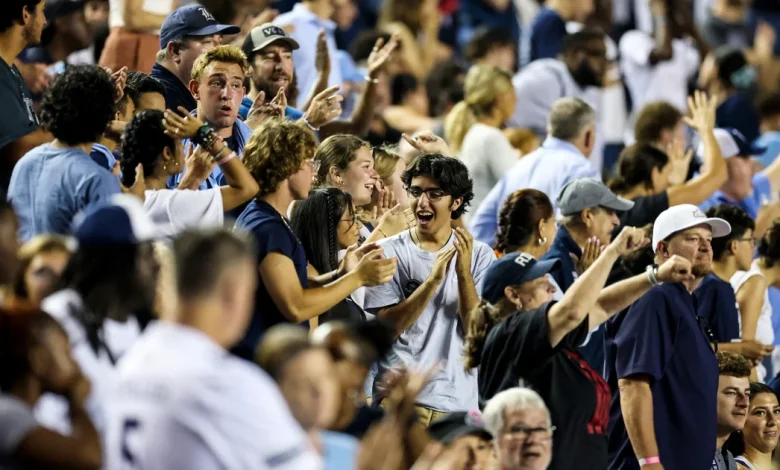 This college wants more students at a big football game. It's offering free beer.