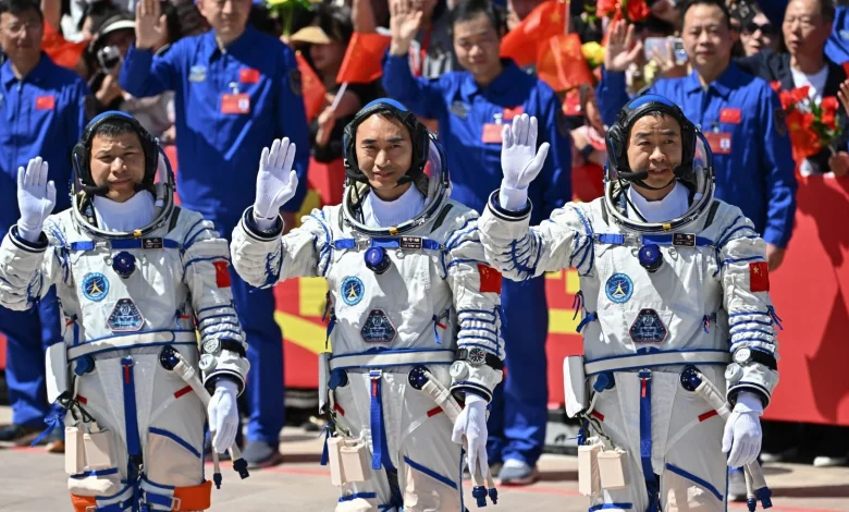 Three Chinese astronauts stranded in space after debris hits their return capsule