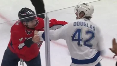 Tom Wilson takes on 6'9 Curtis Douglas.