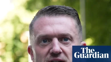 Tommy Robinson cleared of terror-related offence over phone code refusal