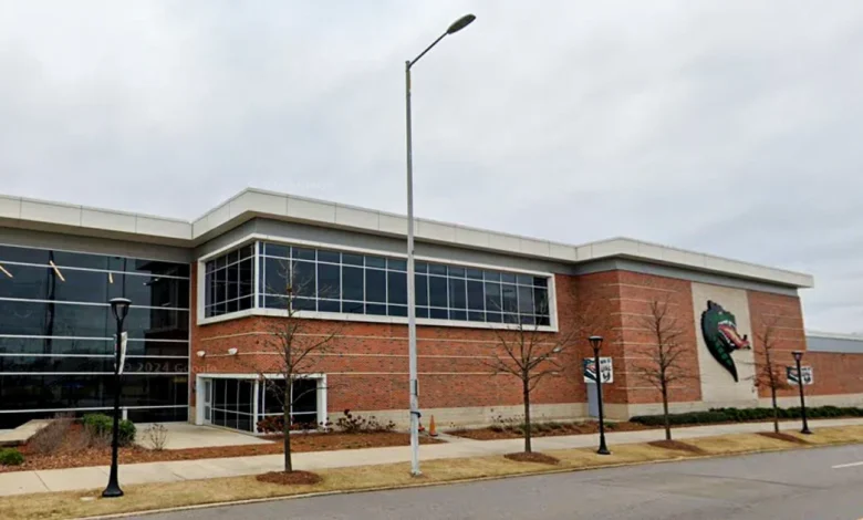 Two Alabama football players hospitalized and teammate detained, school says