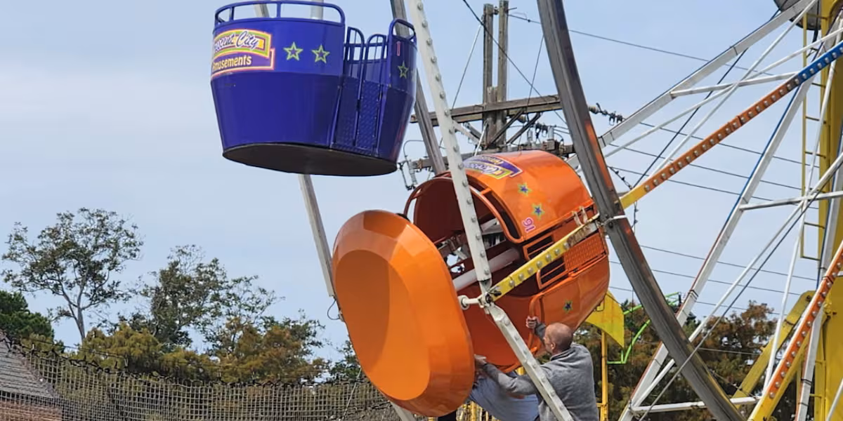 Two girls remain hospitalized after ferris wheel accident at New Roads festival