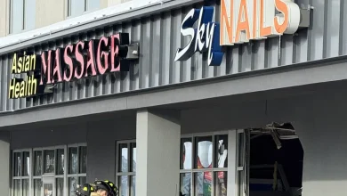 Vehicle drives through front of south Fargo business