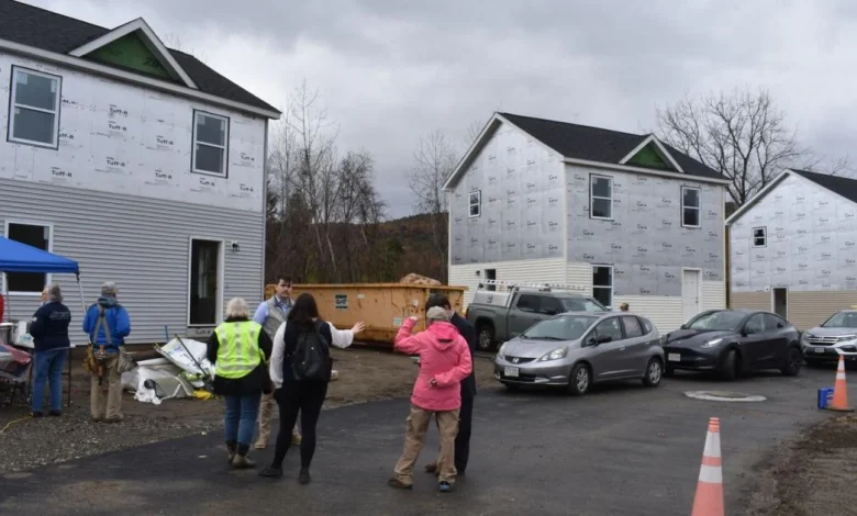 Volunteers fend off rain to help Central Berkshire Habitat for Humanity's Carter build day