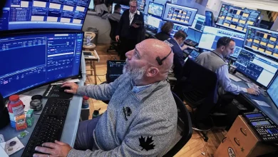 Wall Street keeps swinging as US stocks give up most of a big early surge