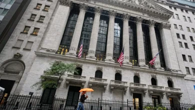 Wall Street points to tiny gains ahead of the open on mixed corporate earnings results