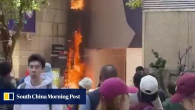 Wall of Hong Kong’s Lee Theatre Plaza catches fire at lunchtime