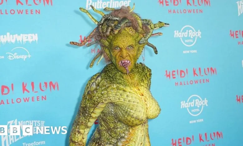 Watch: Heidi Klum slithers into Halloween as Medusa