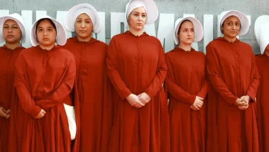 What inspired the outfits in Margaret Atwood's "The Handmaid's Tale"