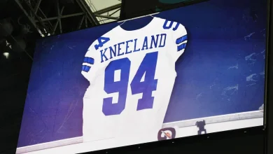 Why are Cowboys wearing No. 94 helmet decals?