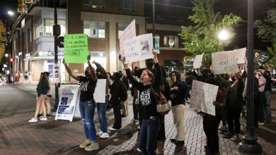 'You can't be a family if you hate half of your population': Group protests TPUSA event