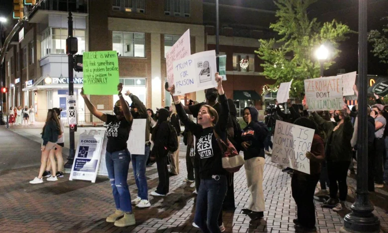 'You can't be a family if you hate half of your population': Group protests TPUSA event