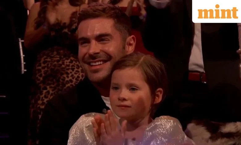 Zac Efron shows up at Dancing with the Stars semifinals to support Dylan during Prince-themed night