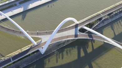 zaha hadid architects draws from silk embroidery of hangzhou with serpentine footbridge