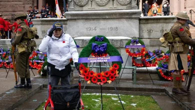 ‘We hold high the torch they threw us’: Remembrance Day ceremony at Old City Hall honours the fallen