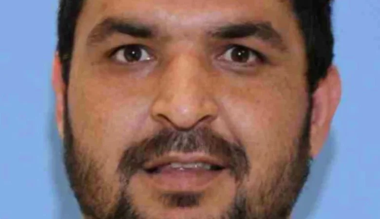 Accused National Guard shooter held without bond after pleading not guilty to murder and assault charges from hospital bed