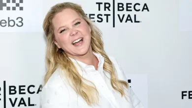 Amy Schumer shares glam new Instagram pics, with adorable photobomb