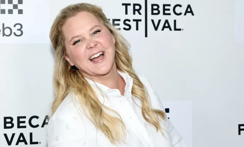 Amy Schumer shares glam new Instagram pics, with adorable photobomb