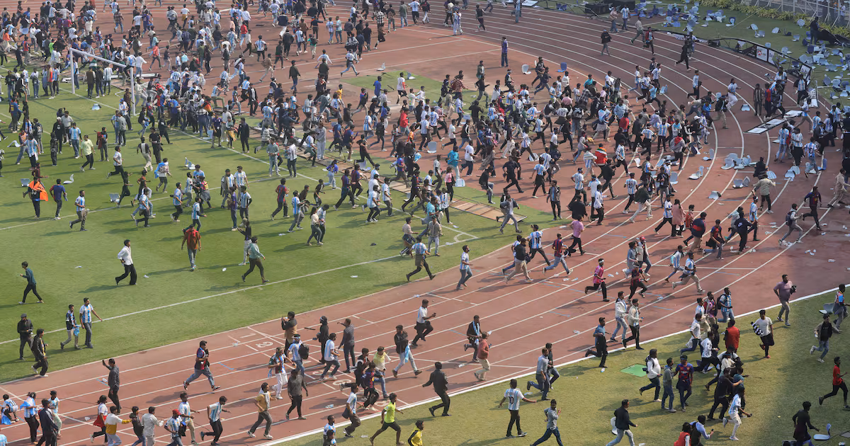 Angry fans throw objects, invade pitch after Lionel Messi’s brief appearance at India event