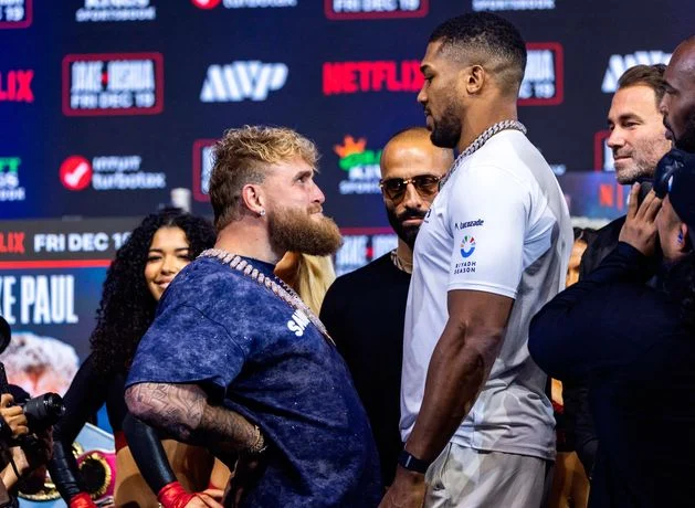 Anthony Joshua weighs over 12kg – two stone – more than Jake Paul at official weigh-in for Netflix fight