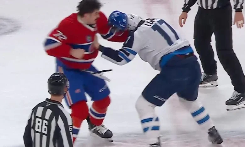 Arber Xhekaj drops Adam Lowry in a heated centre-ice fight