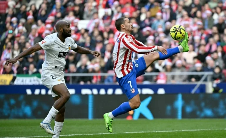 Atletico recover Liga momentum with battling win over Valencia