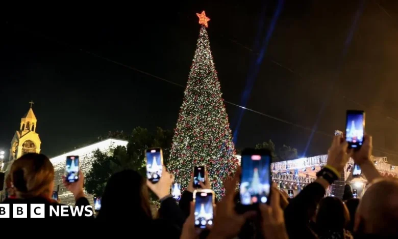 Bethlehem Christmas tree lights up for first time since start of Gaza war