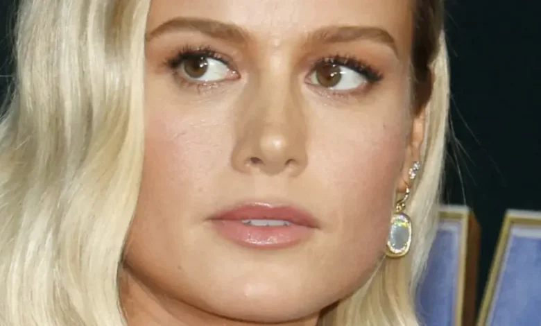 Brie Larson Highlights 'The Best Pair' In Braless Glitter Dress