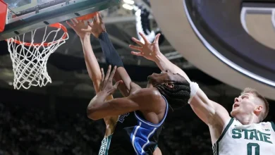 Cameron Boozer scores 18 in No. 4 Duke’s 66-60 win over No. 7 Michigan State