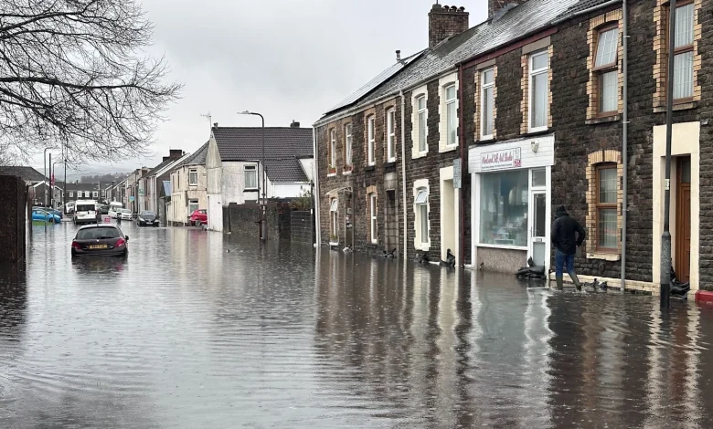 Cars trapped and roads closed as heavy rain causes flooding in Wales | ITV News