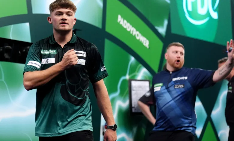 Debutant Charlie Manby, 20, pulls off World Darts Championship's biggest upset