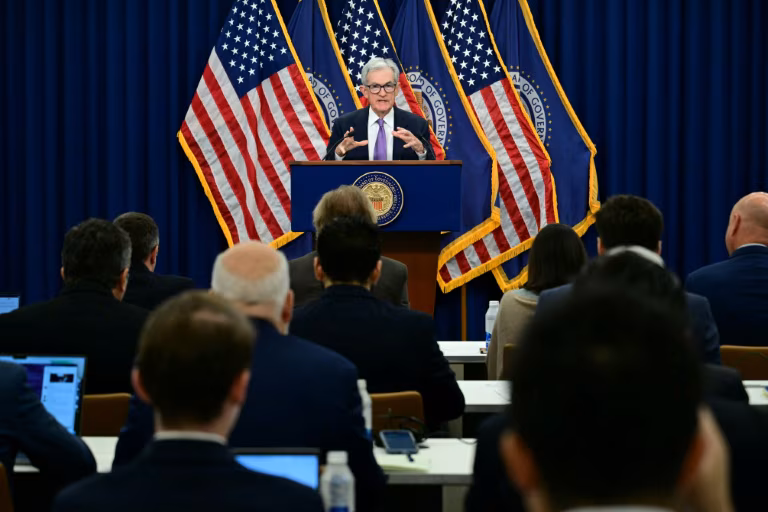 Divided US Fed makes third straight rate cut on jobs risks