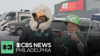 Eagles fans brave the snow and cold hours before kickoff at Lincoln Financial Field