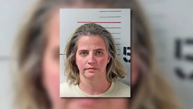 Elementary teacher accused of threatening to "chop" colleague with paper cutter