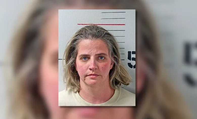 Elementary teacher accused of threatening to "chop" colleague with paper cutter