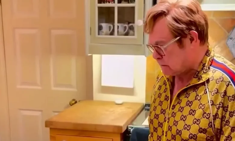 Elton John mocks his own Christmas hit with spoof video