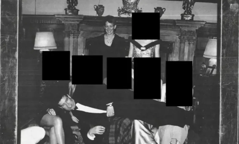 Epstein files reveal photo of Andrew Mountbatten Windsor laying across women’s laps