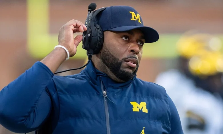 Ex-UM coach Moore detained by police after firing