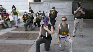 FBI agents sue after being fired for kneeling during racial justice protest