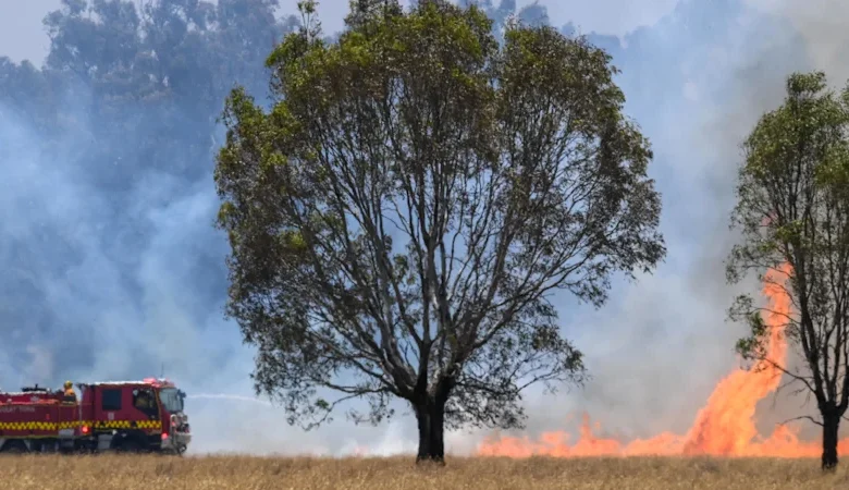 Fire burns in Victoria’s north as state swelters through first heatwave of summer