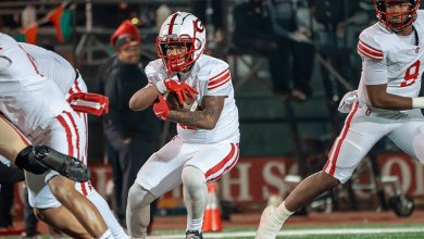 Football: Big Red dominates Rome for spot in 5A title game