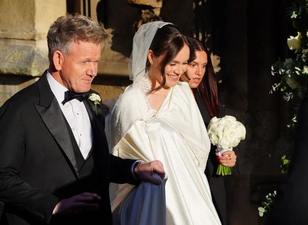 Holly Ramsay arrives to her wedding with famous father by her side