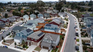 Home prices are poised to dip in 22 U.S. cities next year, a new analysis says. See where.