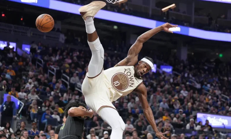 Jimmy Butler avoids injury on scary fall, ignites Warriors offense without Curry