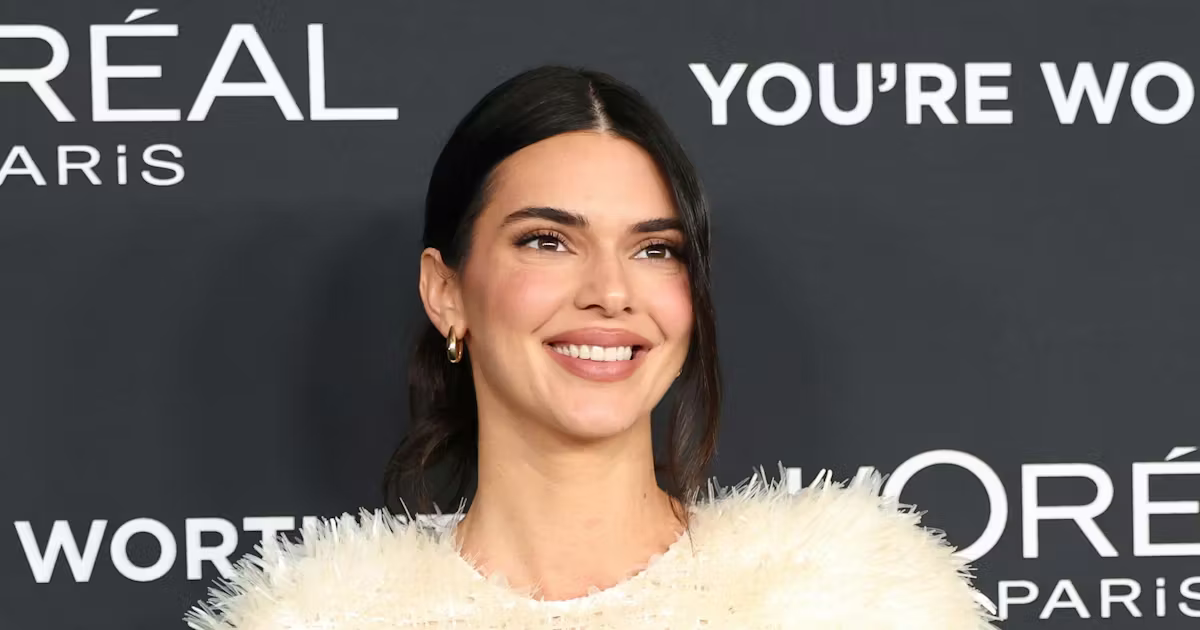 Kendall Jenner Skips the Holiday Clichés in Snow White Party Dress