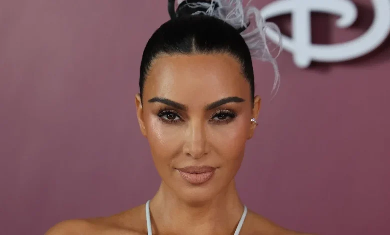 Kim Kardashian clings onto summer in itsy bitsy leopard print bikini