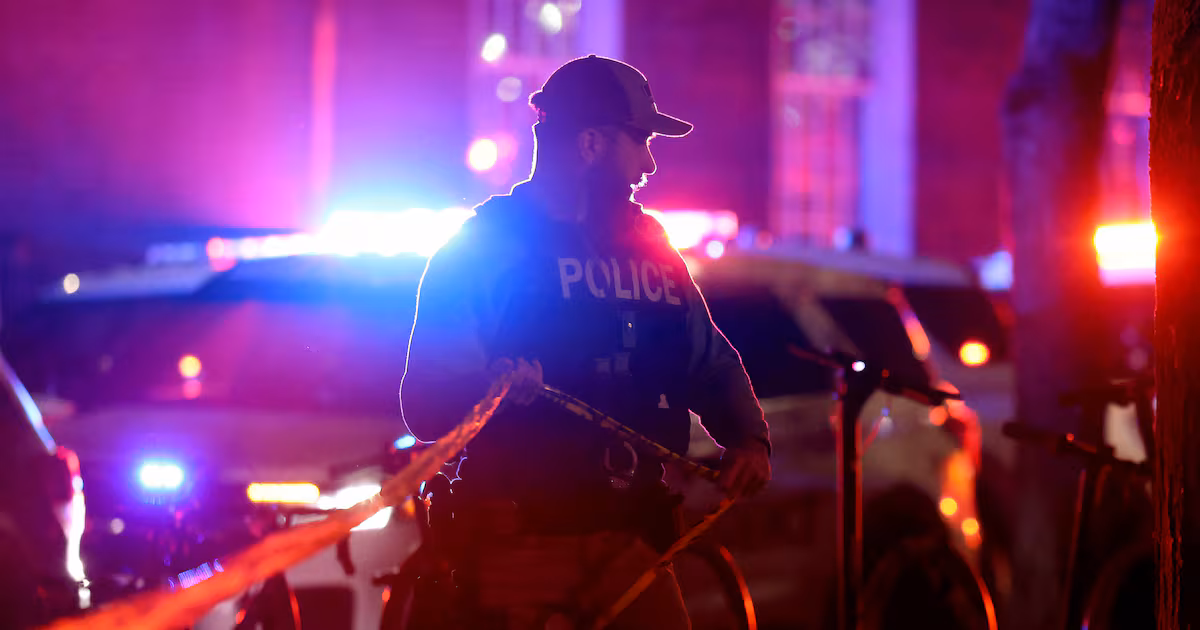 Manhunt under way at Brown University after gunman kills two and wounds nine