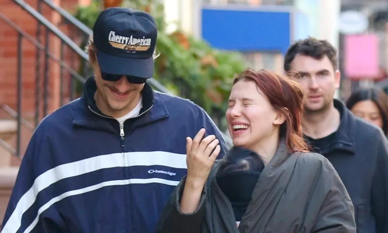 Millie Bobby Brown Bundles Daughter Under Her Coat on Walk with Jake Bongiovi