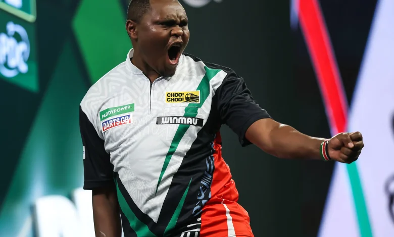 Munyua makes history as Van Gerwen survives scare at World Championship