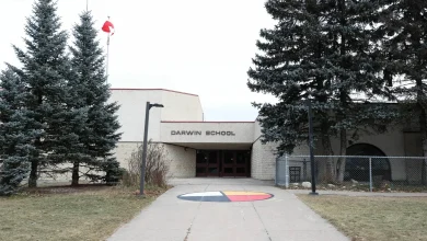 Nervous parents greeted by locked door, guards at site of school assault